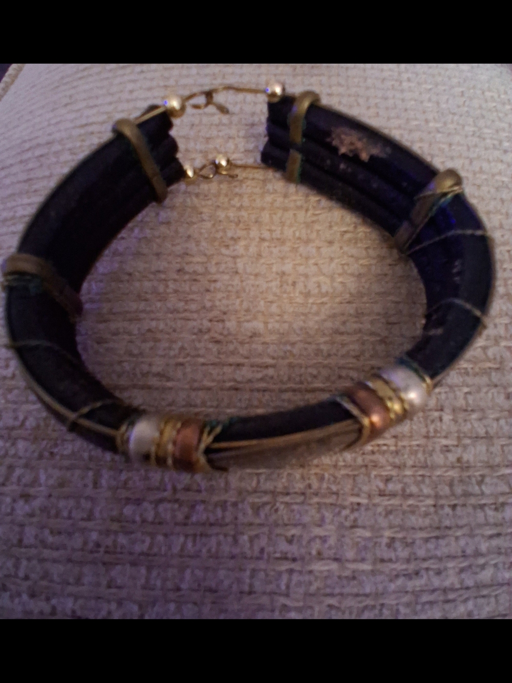 Multistrand Black Bracelet with Mixed Gold Accents